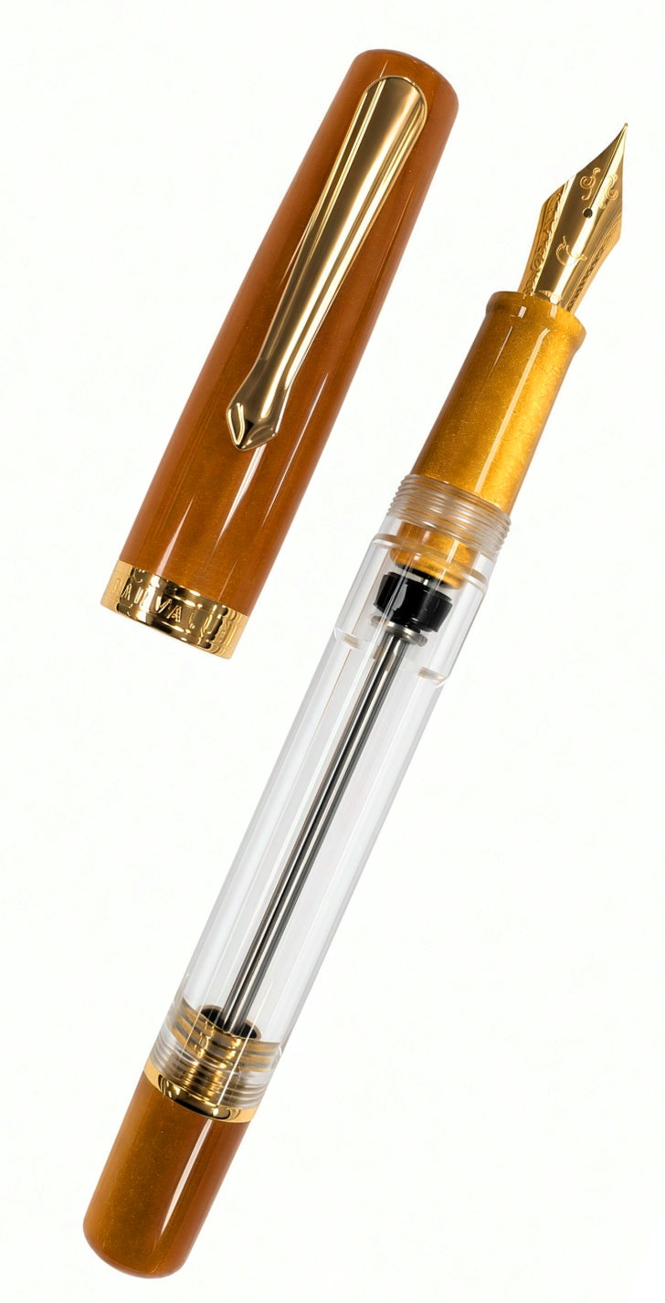 A Nahvalur Original Plus Fountain Pen - Fountain Pen Day 2026 (Limited Edition) in amber acrylic with a gold nib, shown with its matching cap and transparent body.