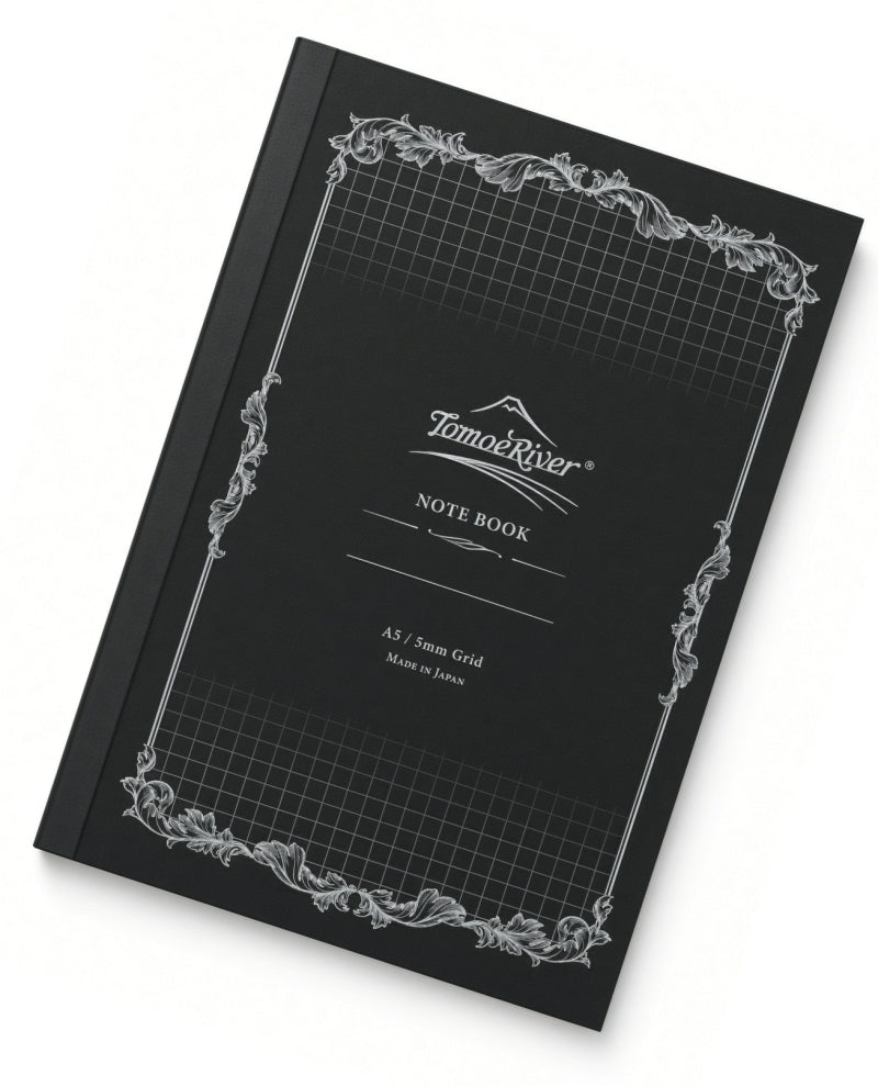 Black Tomoe River A5 Notebook - Graph (52gsm) with a grid pattern on the cover, ornate white decorative borders, and text reading NOTE BOOK and A5 / 5mm Grid.