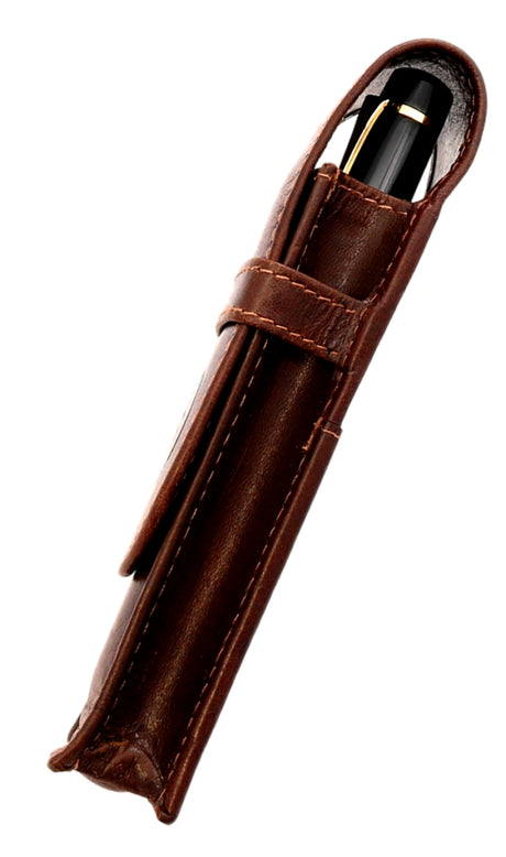 The FPR Compact Two Pen Leather Case, crafted from brown leather and designed as a space-saving pen holder, is displayed upright on a white background holding a black pen with gold accents.