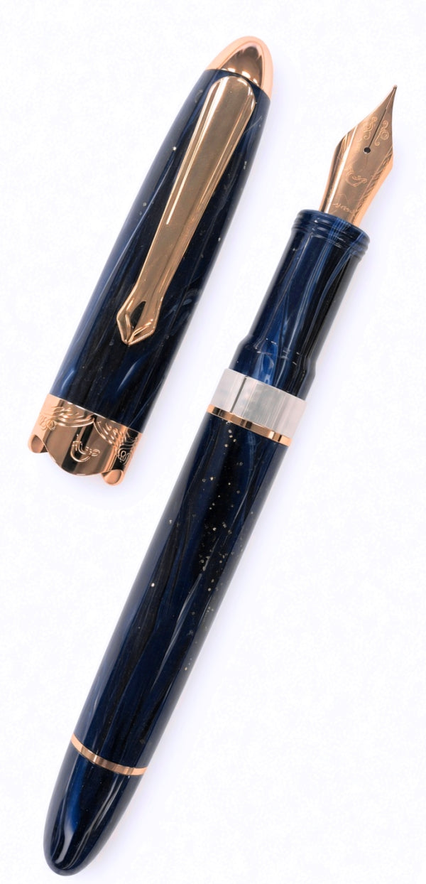 Nahvalur Horizon fountain pen in dark blue with a marbled, pearlescent finish and rose gold trim, shown with its cap removed.