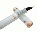 Translucent white Opus 88 Harmony fountain pen with copper-colored accents, featuring a silhouette of a dancer and the text 2026 Cloud Dancer on the barrel.