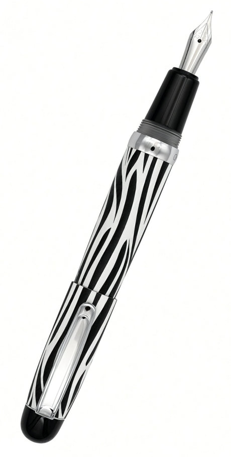 Opus 88 Mini Pocket Pen featuring a black and white zebra-striped body, a silver clip, and a black cap end.