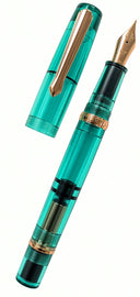 Translucent teal Nahvalur Original Fountain Pen with rose gold trim and a detached cap, shown against a white background.