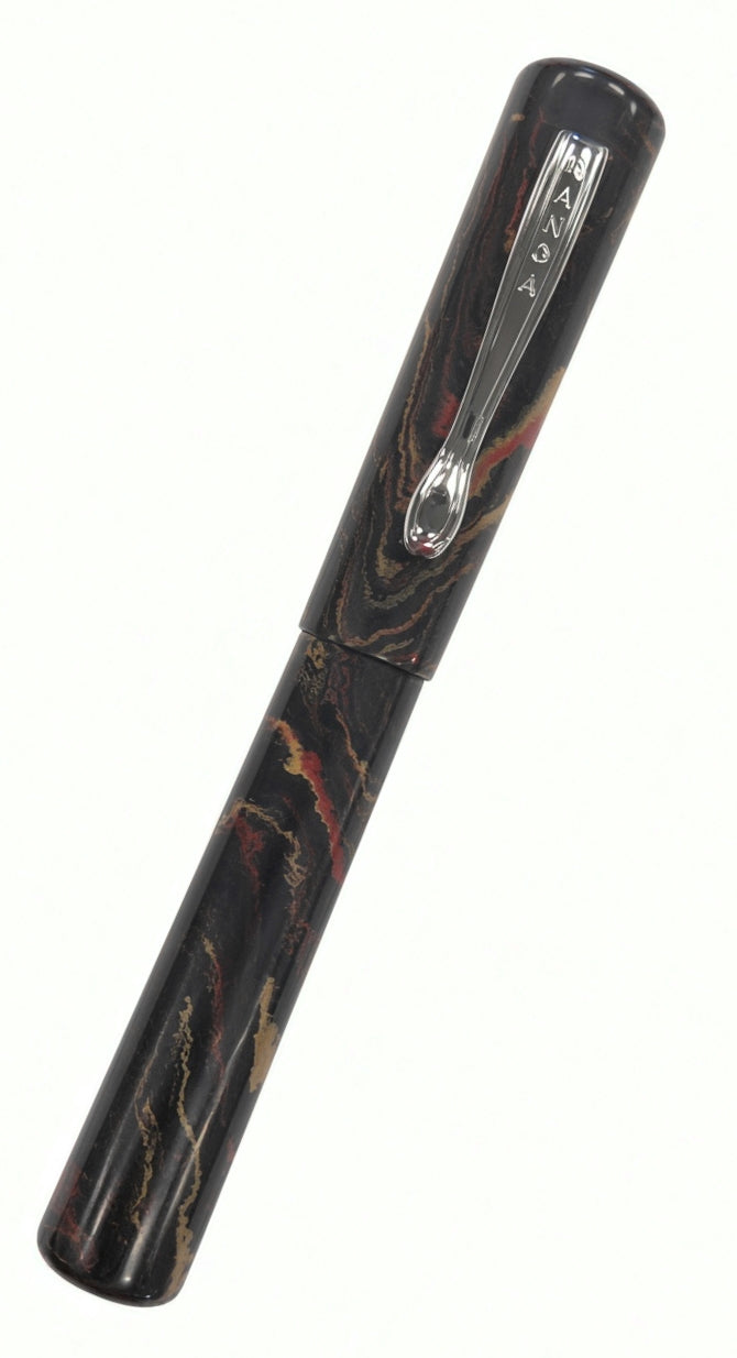 Ranga Radiant fountain pen in a black, red, and gold marbled pattern with a silver clip.