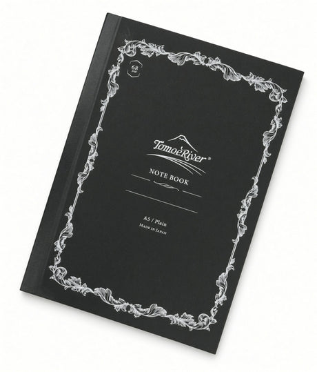 Black A5 Tomoe River Notebook - Blank (68gsm) with a decorative white border, featuring the text Tomoe River, NOTE BOOK, 68 gsm, and A5 / Plain on the cover.