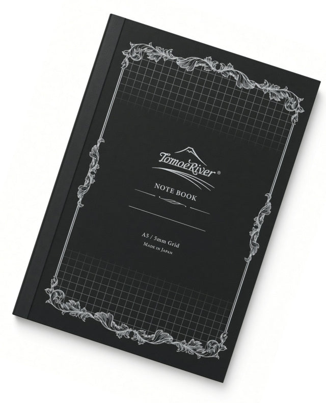 Black Tomoe River A5 Notebook - Graph (52gsm) with a grid pattern on the cover, ornate white decorative borders, and text reading NOTE BOOK and A5 / 5mm Grid.