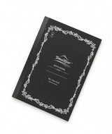 Tomoe River B6 Notebook - Dot Grid (68gsm) with a black cover, white ornate border, and NOTE BOOK printed on the front; this fountain pen friendly, dot grid stationery is ideal for detailed journaling.