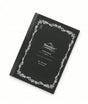 Tomoe River B6 Notebook - Dot Grid (68gsm) with a black cover, white ornate border, and NOTE BOOK printed on the front; this fountain pen friendly, dot grid stationery is ideal for detailed journaling.